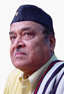 Man wearing a Nepali cap